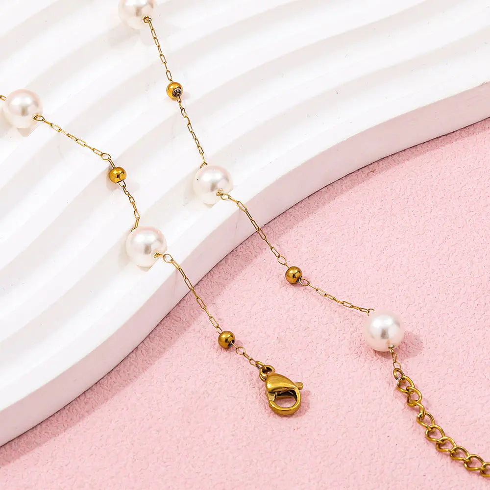 Orbit. Necklace worn