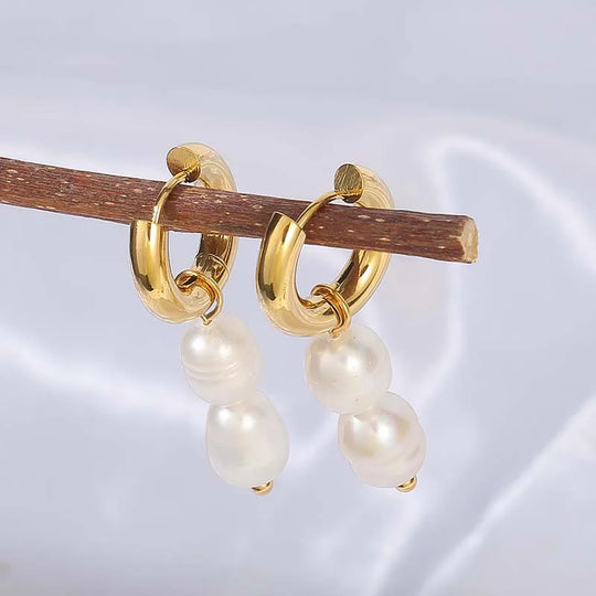 Ivory. Hoops worn