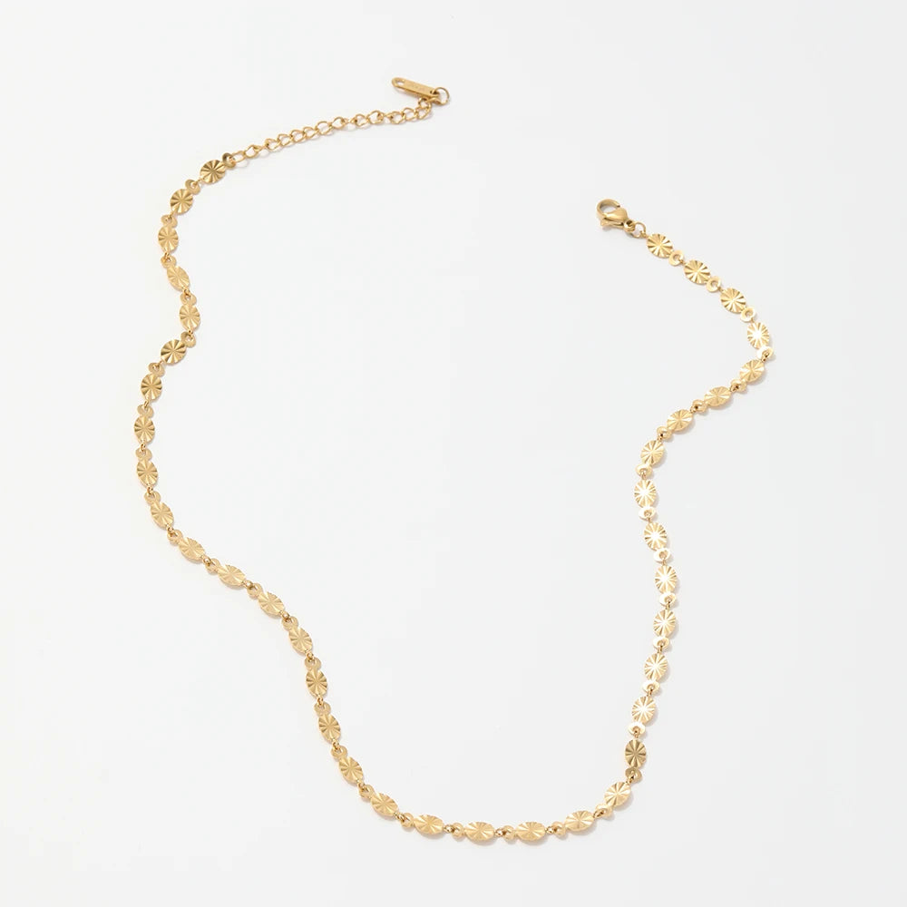Sheen. Necklace worn