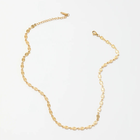 Sheen. Necklace worn