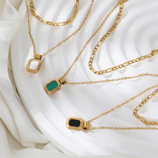 Tier. Necklace worn