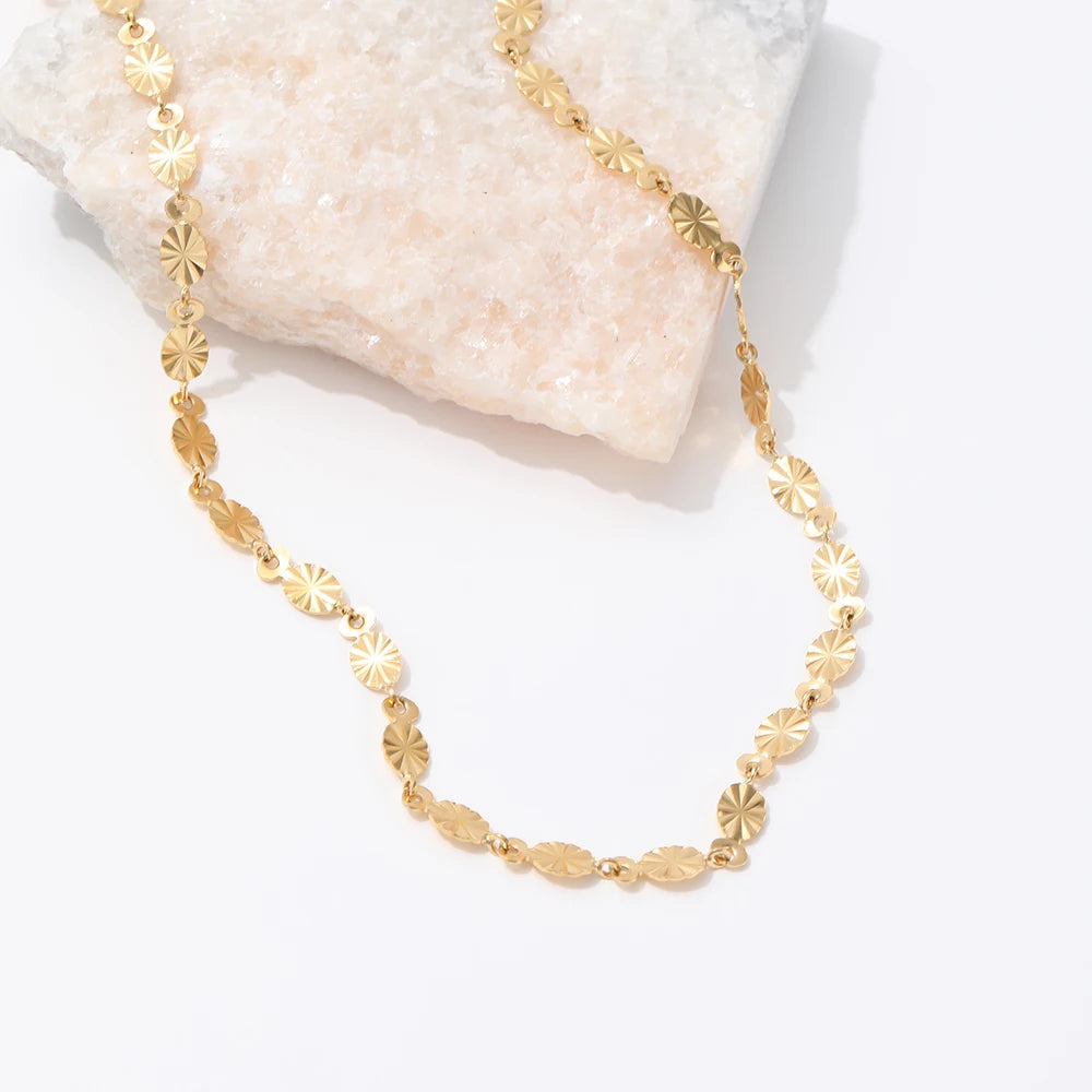Sheen. Necklace worn