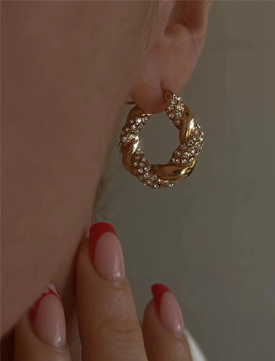 Twist. Hoops worn