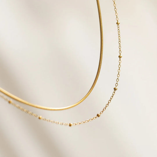 Strand. Necklace worn