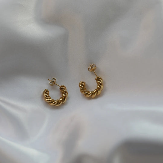 Braid. Hoops worn
